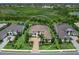 An elevated view of a home with well-kept landscaping, and beautiful curb appeal at 16917 Clearlake Ave, Lakewood Ranch, FL 34202