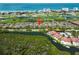 Picturesque community nestled alongside a golf course and waterfront, offering luxurious living at 2181 Harbourside Dr # 1403, Longboat Key, FL 34228