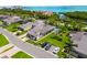 Well landscaped property with mature trees, in a community close to shops, restaurants and the ocean at 2181 Harbourside Dr # 1403, Longboat Key, FL 34228