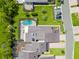 Birds eye view of a private home, mature trees, manicured lawns and proximity to community amenities at 2181 Harbourside Dr # 1403, Longboat Key, FL 34228