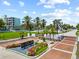 Inviting community entrance with lush landscaping, creating a welcoming atmosphere at 2181 Harbourside Dr # 1403, Longboat Key, FL 34228