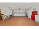 Spacious garage offers ample room for vehicles, storage, and projects at 2181 Harbourside Dr # 1403, Longboat Key, FL 34228
