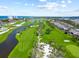 Scenic golf course with water features, perfect for a relaxing day on the links at 2181 Harbourside Dr # 1403, Longboat Key, FL 34228