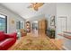 Open living area with hardwood floors, vaulted ceilings, and bright natural light at 2181 Harbourside Dr # 1403, Longboat Key, FL 34228