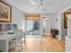 Comfortable office with ceiling fan and sliding glass door to exterior at 2181 Harbourside Dr # 1403, Longboat Key, FL 34228