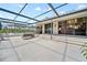 An oversized screened patio that provides ample space for entertaining and outdoor living at 2181 Harbourside Dr # 1403, Longboat Key, FL 34228
