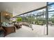 Comfortable screened patio offers an excellent outdoor entertainment space at 2181 Harbourside Dr # 1403, Longboat Key, FL 34228