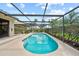 Sparkling screened pool offers a tranquil retreat with lush landscaping and privacy at 2181 Harbourside Dr # 1403, Longboat Key, FL 34228