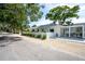 Charming home with a well-maintained yard and a white picket fence at 2189 Hillview St, Sarasota, FL 34239