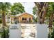 Charming home with a welcoming front porch and stylish desert landscaping at 2189 Hillview St, Sarasota, FL 34239