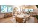 Bright living room featuring a neutral color palette, light hardwood floors, and stylish, comfortable furniture at 2189 Hillview St, Sarasota, FL 34239