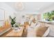 Inviting living room with a comfortable sofa and view into the kitchen at 2189 Hillview St, Sarasota, FL 34239
