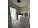 Laundry room with washer, dryer, and access door to the backyard at 22214 Felton Ave, Port Charlotte, FL 33952