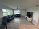 Living room featuring neutral walls, light colored floors and lots of natural light at 22214 Felton Ave, Port Charlotte, FL 33952