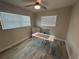 Office features wooden floors, work desk, dresser, and rolling chair at 22214 Felton Ave, Port Charlotte, FL 33952