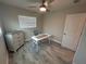 Office with hardwood floors, ceiling fan, and window at 22214 Felton Ave, Port Charlotte, FL 33952