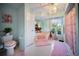 Relaxing bathroom with a soaking tub and a large window at 22378 Peachland Blvd, Port Charlotte, FL 33954