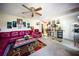 Comfortable living room with a ceiling fan and decorative accents throughout at 22378 Peachland Blvd, Port Charlotte, FL 33954