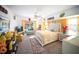 Bright main bedroom with a sliding glass door leading to the outdoor pool at 22378 Peachland Blvd, Port Charlotte, FL 33954
