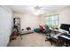Spacious office with ample workspace, carpet, and built-in storage for organizational convenience at 22378 Peachland Blvd, Port Charlotte, FL 33954