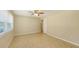 Bedroom featuring tile floors, a ceiling fan, and a closet, perfect for creating a personalized retreat at 2462 Hyde Park St, Sarasota, FL 34239