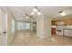Eat-in kitchen with tile floors and stainless steel appliances, perfect for casual dining and meal preparation at 2462 Hyde Park St, Sarasota, FL 34239
