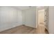 Neutral bedroom showcasing a closet, bright walls and wood-style flooring at 248 Altamura Cir, Nokomis, FL 34275