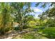 This canal front backyard has a fence at 2504 Tanglewood Dr, Sarasota, FL 34239