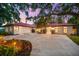 This home is on a large lot and has a circular driveway at 2504 Tanglewood Dr, Sarasota, FL 34239