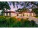 This home is on a large lot and has a circular driveway at 2504 Tanglewood Dr, Sarasota, FL 34239