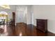Inviting entryway featuring hardwood floors with views of the dining room at 2559 Wood Oak Dr, Sarasota, FL 34232