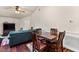 Inviting living room featuring a dining area, hardwood floors, and comfortable seating at 2559 Wood Oak Dr, Sarasota, FL 34232