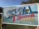 Informative sign highlighting Siesta Beach as the #1 beach in the USA, located in Sarasota, Florida at 2559 Wood Oak Dr, Sarasota, FL 34232