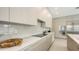 Contemporary kitchen with sleek countertops and stainless steel appliances at 2590 Floyd St, Sarasota, FL 34239