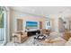 Bright and airy living room featuring neutral tones, stylish furniture, and a relaxing atmosphere at 2590 Floyd St, Sarasota, FL 34239