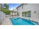 Beautiful backyard swimming pool with patio and outdoor kitchen perfect for entertaining at 2590 Floyd St, Sarasota, FL 34239