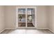 Balcony with views of a lake, palm trees, and a multi-story building at 3635 Lake Bayshore Dr # J-410, Bradenton, FL 34205