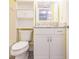 This bathroom features a shower, toilet, and a vanity at 3635 Lake Bayshore Dr # J-410, Bradenton, FL 34205