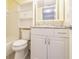 This bathroom features a shower, toilet, and a vanity at 3635 Lake Bayshore Dr # J-410, Bradenton, FL 34205