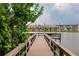 Picturesque dock overlooking a serene lake, providing a peaceful waterfront setting at 3635 Lake Bayshore Dr # J-410, Bradenton, FL 34205