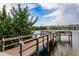 Picturesque dock overlooking a serene lake, providing a peaceful waterfront setting at 3635 Lake Bayshore Dr # J-410, Bradenton, FL 34205