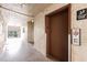 Well-lit hallway near the elevator access provides a smooth transition for residents at 3635 Lake Bayshore Dr # J-410, Bradenton, FL 34205