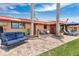 Exterior shot of backyard featuring a patio and well manicured lawn at 3850 Catalina Dr, Bradenton, FL 34210