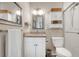 Neutral bathroom featuring granite countertops and a walk-in shower at 3850 Catalina Dr, Bradenton, FL 34210