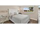 Comfortable bedroom featuring a queen bed and view to outside at 3850 Catalina Dr, Bradenton, FL 34210