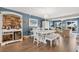 Spacious dining area featuring stylish decor, a large table, and a view of the water at 3850 Catalina Dr, Bradenton, FL 34210