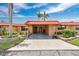 Charming home featuring well-kept landscaping, an orange roof, and a covered carport at 3850 Catalina Dr, Bradenton, FL 34210