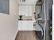 Functional laundry room featuring modern washer and dryer at 3850 Catalina Dr, Bradenton, FL 34210