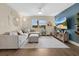 Inviting living room with a comfortable sectional, modern decor, and a relaxing ambiance at 3850 Catalina Dr, Bradenton, FL 34210