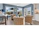 Comfortable seating area with wicker furniture and scenic views of the waterway at 3850 Catalina Dr, Bradenton, FL 34210